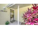 Inviting entryway with a view into a living room at 16450 Gloria Ln # 105, Nokomis, FL 34275