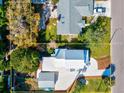 Aerial view of the property showcasing the home's layout, landscaping, and surrounding neighborhood at 1810 28Th W St, Bradenton, FL 34205