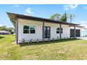 Modern two-bedroom house with a two-car garage at 4593 Targee Ave, North Port, FL 34287