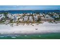 Beachfront home next to other houses and the ocean at 2510 Gulf N Dr, Bradenton Beach, FL 34217