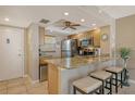 Well-equipped kitchen featuring granite countertops and stainless steel appliances at 1300 N Portofino Dr # 305, Sarasota, FL 34242