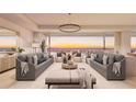Spacious living room with ocean view at 70 Avenida Veneccia # 401, Sarasota, FL 34242