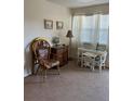 Small dining area with table and chairs, near a window at 4480 Ironwood Cir # 308A, Bradenton, FL 34209