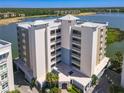 Condo building showcasing modern architecture and water access at 10520 Boardwalk Loop # 302, Bradenton, FL 34202