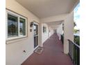 Clean condo hallway with access to individual units at 220 Santa Maria St # 240, Venice, FL 34285