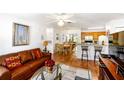 Open living room and kitchen with hardwood floors at 4850 51St W St # 4204, Bradenton, FL 34210