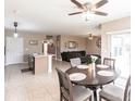 Open dining area with views of the kitchen and living room at 7380 Mikasa Dr, Punta Gorda, FL 33950