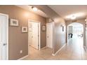 Entryway with tiled floors and light brown walls leads to living area at 7380 Mikasa Dr, Punta Gorda, FL 33950