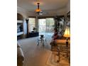 Spacious living room with comfortable seating and access to balcony at 5146 Northridge Rd # 201, Sarasota, FL 34238