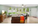 Spacious living room with ample natural light and comfortable seating at 907 E Rosedale Rd, Venice, FL 34293