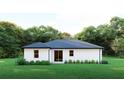 Rear view of a house with a sliding glass door at 23453 Winthrob Ave, Port Charlotte, FL 33980