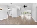 Open living room with tile floors and high ceilings at 4709 Foy Pl, Sarasota, FL 34243