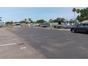 Community boat and RV storage area with parking spaces at 191 Palm Air Dr, Osprey, FL 34229
