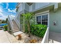 Exterior view showing stairs and landscaping at 2002 Bal Harbor Blvd # 1311, Punta Gorda, FL 33950