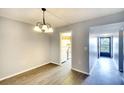 Bright dining room with wood-look floors at 505 30Th W Ave # E304, Bradenton, FL 34205