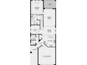 First floor plan features a primary suite, kitchen, great room, dining room, and two-car garage at 15076 Shady Palms Ln, Nokomis, FL 34275