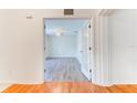 Spacious bedroom with hardwood floors and French doors at 4005 Belladonna Ave, North Port, FL 34286