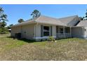 This is a well-maintained home with shutters, a concrete foundation, and a manicured lawn at 4012 Oscar Ter, North Port, FL 34286