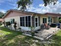 Updated condo with patio, screened porch, and meticulously maintained landscaping at 4540 Tippecanoe Trl # 183, Sarasota, FL 34233