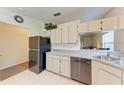 Clean kitchen with stainless steel appliances and ample cabinet space at 1705 Curry Ave # 85, Nokomis, FL 34275