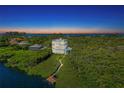 Luxury waterfront home with private dock at 5444 Gulf Of Mexico Dr, Longboat Key, FL 34228