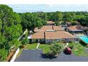 Aerial view of a condo community with a pool, showing a single unit at 773 N Jefferson Ave # 773, Sarasota, FL 34237