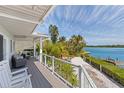 Relaxing deck overlooking the water with seating and beautiful views at 750 Penfield St, Longboat Key, FL 34228