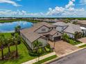 Luxury home with lake view and spacious backyard at 6358 Rivo Lakes Blvd, Sarasota, FL 34241