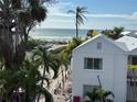 Beachfront property with ocean views and tropical landscaping at 7324 Gulf Dr # 12, Holmes Beach, FL 34217