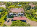 Aerial view of building with carport and surrounding landscape at 3500 El Conquistador Pkwy # 339, Bradenton, FL 34210
