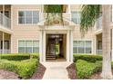 Building entryway with a staircase leading to upper levels at 4802 51St W St # 1305, Bradenton, FL 34210