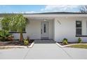 Front entrance of the renovated home with modern design at 353 Suwanee Ave, Sarasota, FL 34243