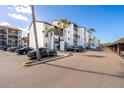 Condominium complex with ample parking at 1602 Stickney Point Rd # 305, Sarasota, FL 34231