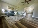 Bright and airy living room with hardwood floors and stylish furnishings at 5609 15Th S Ave, Gulfport, FL 33707