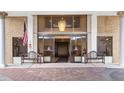 Entrance of Essex House, featuring sliding doors and benches at 5200 Brittany S Dr # 602, St Petersburg, FL 33715