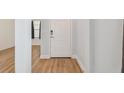 Light and bright entryway with wood-look floors at 10417 Crooked Creek Ct, Parrish, FL 34219