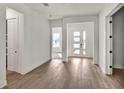 Bright entryway with hardwood floors, and neutral paint at 17931 Palmiste Dr, Bradenton, FL 34202