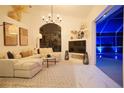 L-shaped sectional sofa and a large TV in a living room at 158 Allworthy St, Port Charlotte, FL 33954