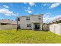 Spacious backyard with basketball hoop and patio at 17119 Harvest Moon Way, Bradenton, FL 34211