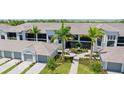 Aerial view showcasing a two-story building with a courtyard at 17445 Opal Sand Dr # 104, Venice, FL 34293