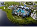 Resort-style pool with expansive sundeck and playground, perfect for Gathering fun at 11671 Great Brook Ln, Parrish, FL 34219