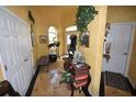 Spacious hallway with decorative elements and access to other rooms at 2107 89Th St Nw, Bradenton, FL 34209