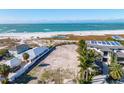 Oceanfront lot with neighboring houses at 769 North Shore Dr, Anna Maria, FL 34216