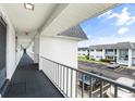 Outdoor balcony walkway with a view of the parking lot at 304 47Th Avenue W Dr # 307, Bradenton, FL 34207