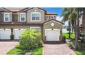 Two-story townhome with two-car garage and lake view at 126 Porta Vecchio Bnd # 202, North Venice, FL 34275