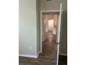 Condo hallway with new flooring and neutral walls at 4102 Central Sarasota Pkwy # 922, Sarasota, FL 34238