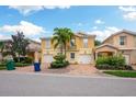 Beautiful townhome with 2-car garage and lush landscaping at 7676 Bergamo Ave, Sarasota, FL 34238