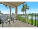 Relaxing screened balcony overlooking a lake at 17724 Gawthrop Dr # 201, Bradenton, FL 34211