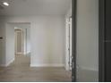 Bright and airy entryway with tile floors and multiple doors at 10748 Klee Ave, Bradenton, FL 34212