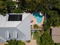 Aerial view of home with pool and lush landscaping at 213 75Th St, Holmes Beach, FL 34217